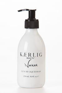 glass bottle of naked luxury liquid soap